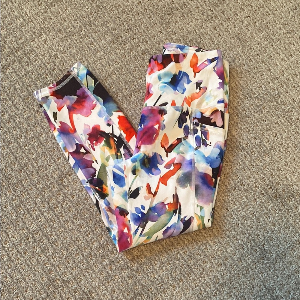 EUC RBX workout leggings with side pockets size small floral